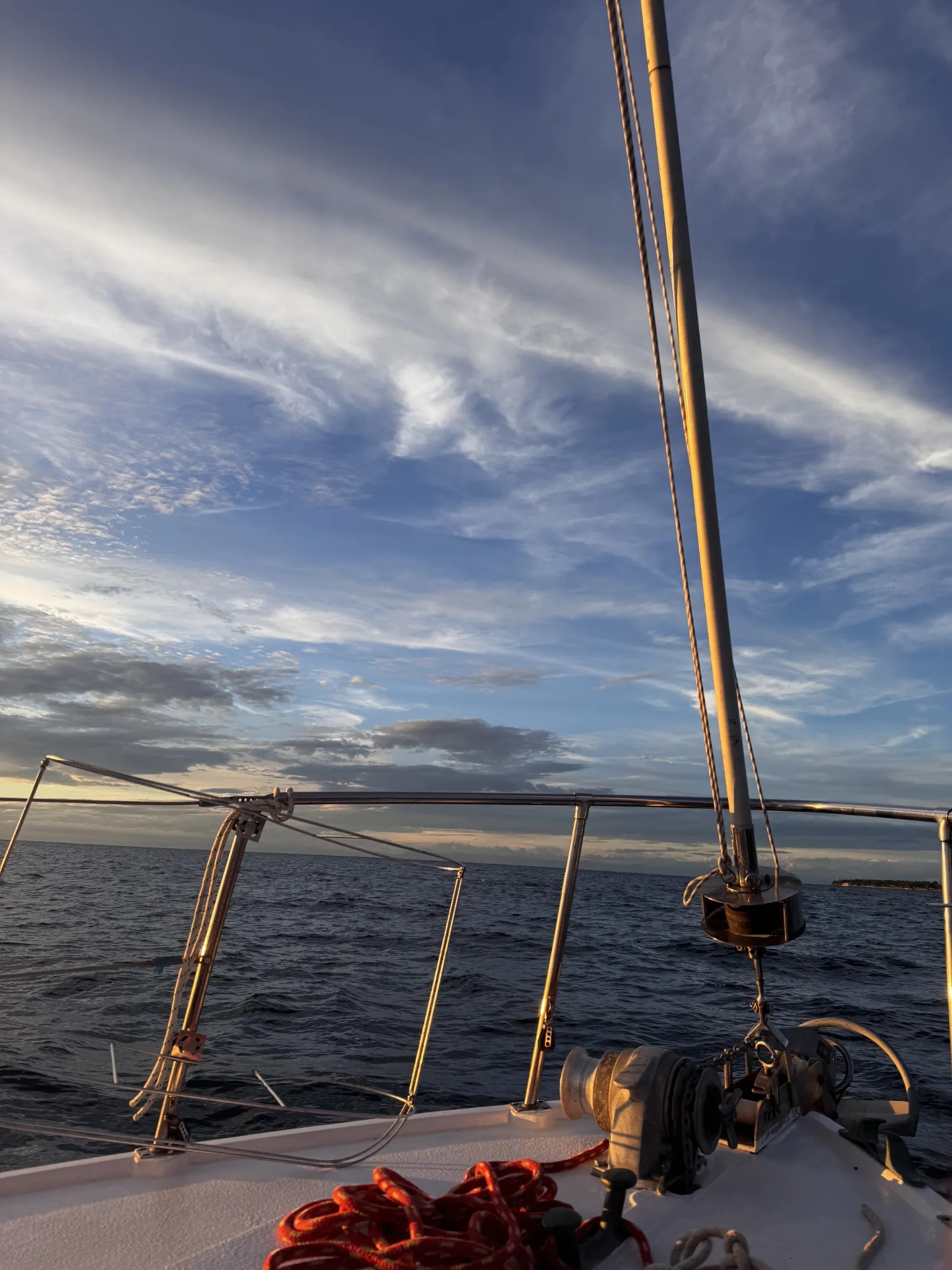 STRIGA's rigging against a calm evening sky at dusk